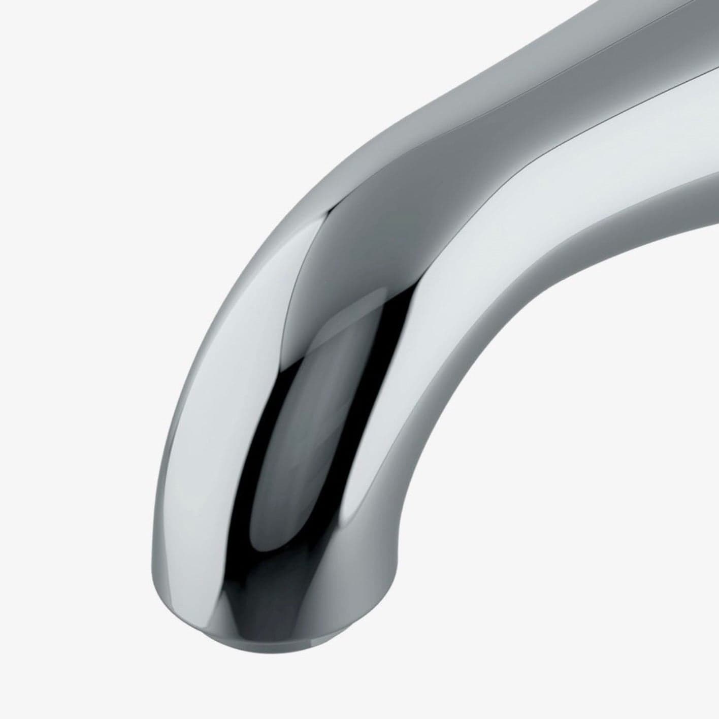Waterworks Opus wall mounted tub spout in chrome with curved brass design