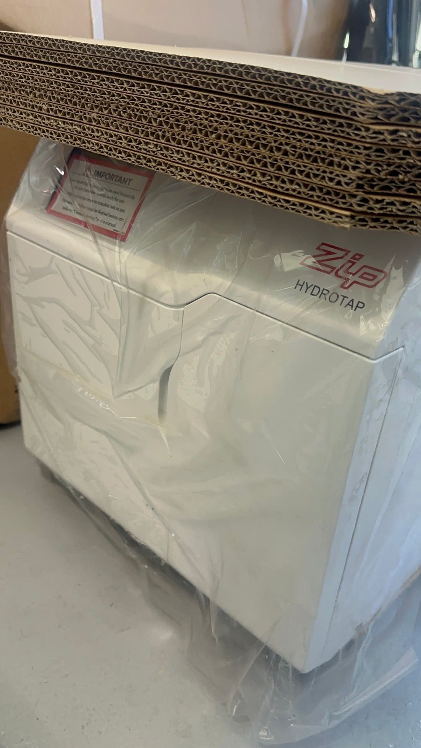 Zip HydroTap under-counter water system, new in plastic wrap
