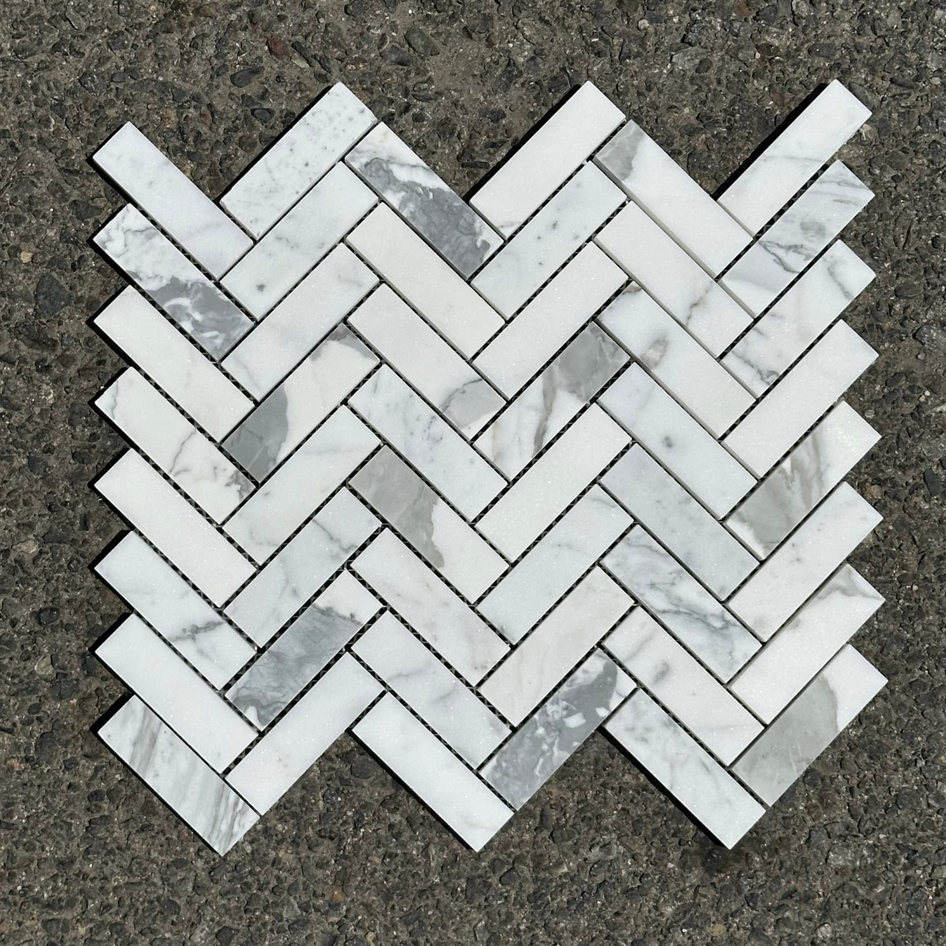 Statuary White Marble 1x3 Herringbone Mosaic Tile in honed matte finish