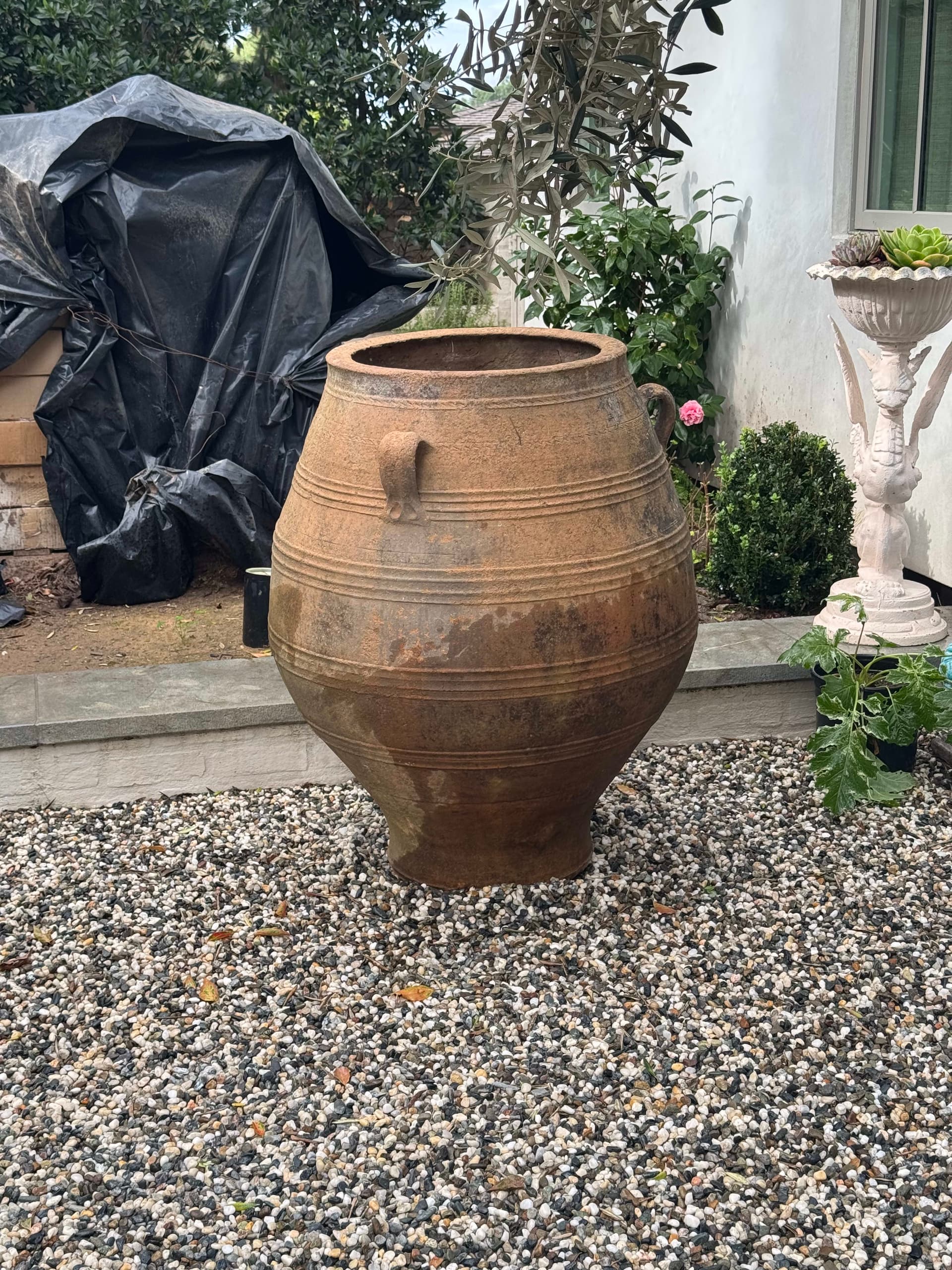 Pair of garden urns, approximately 42-45 inches high and 36 inches wide