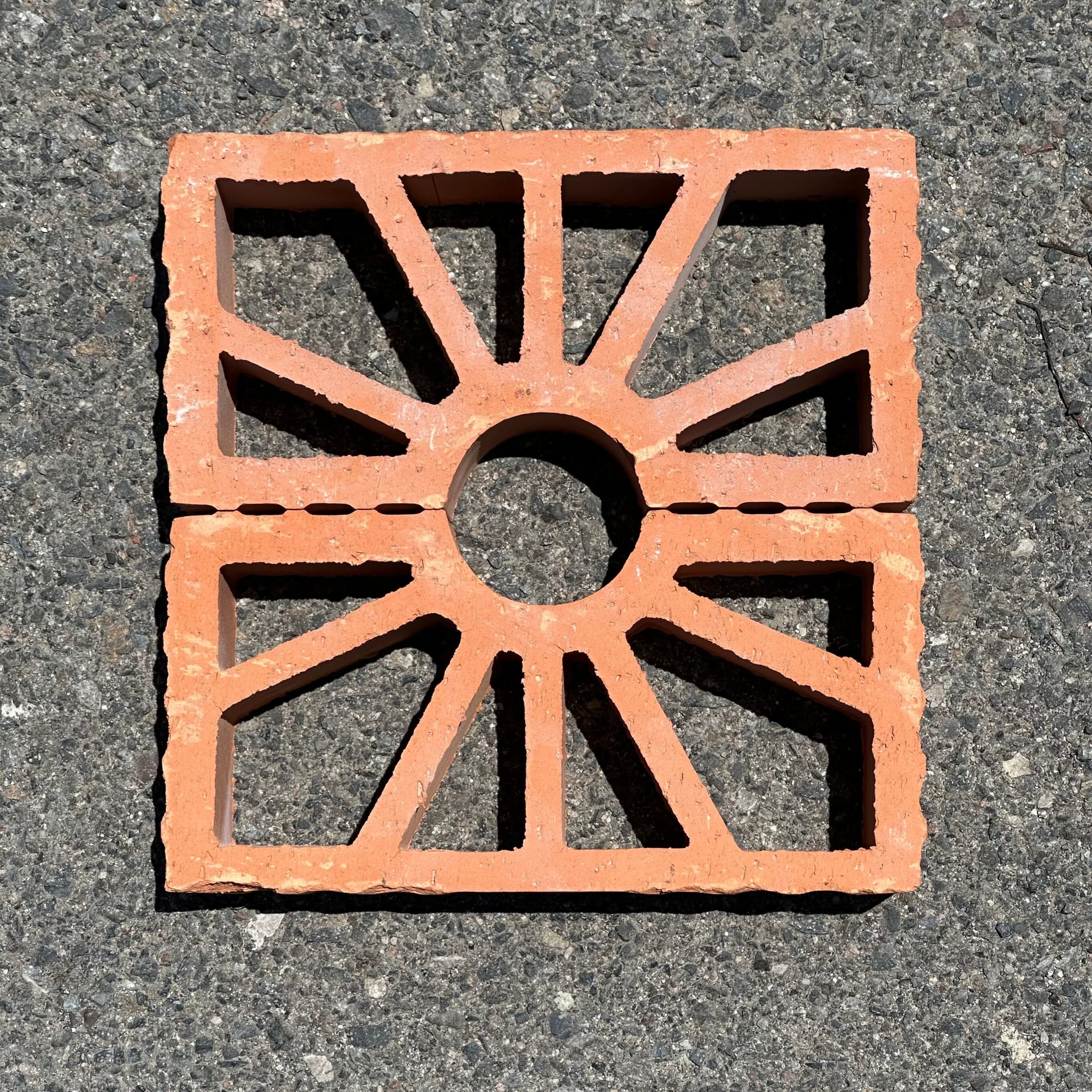 Riad Tile Sun Breeze Block terracotta decorative tile with sun-shaped cutout, 9⅜"×4⅜"×2⅜"