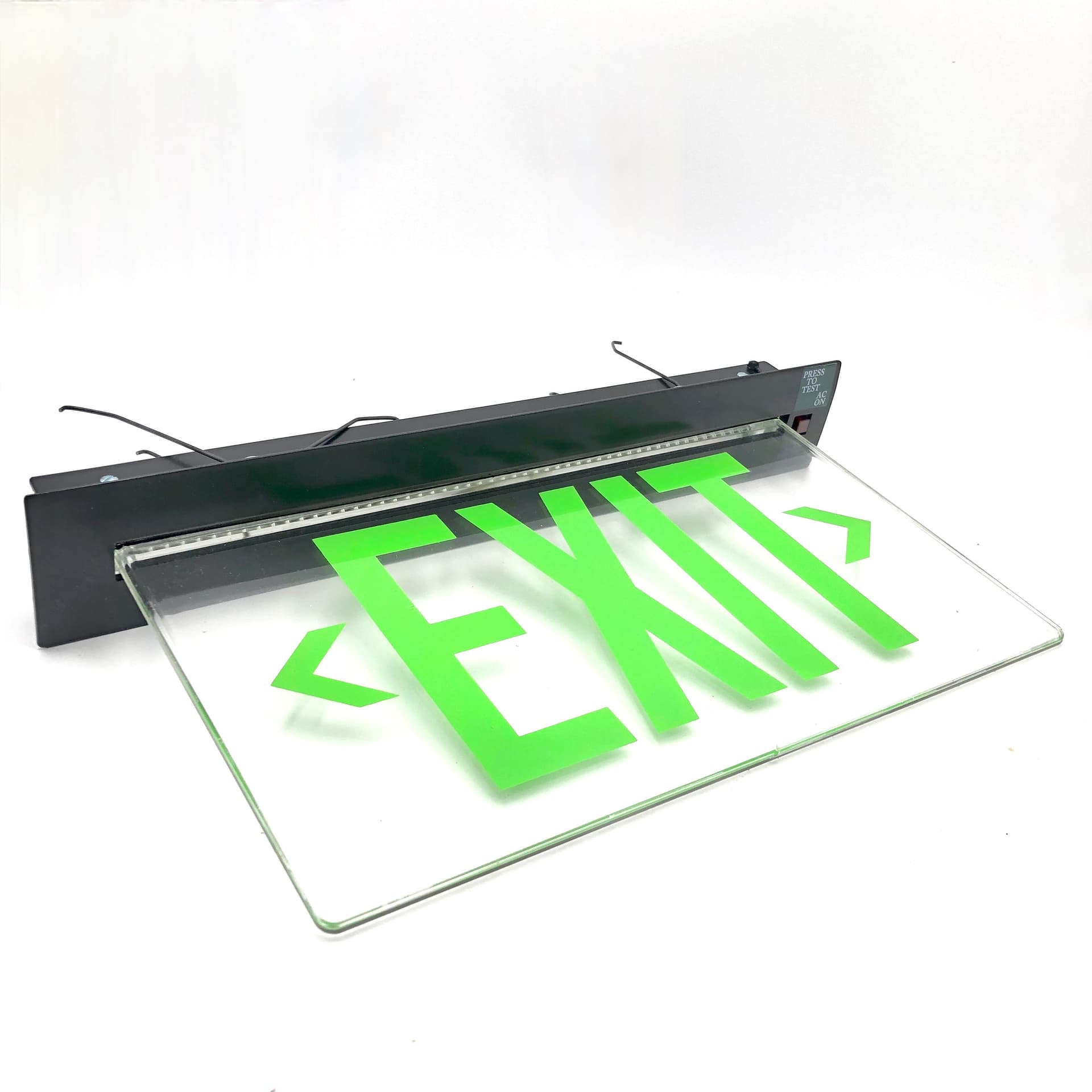 Cooper Lighting Sure-Lites ES Series exit sign with green letters and clear background