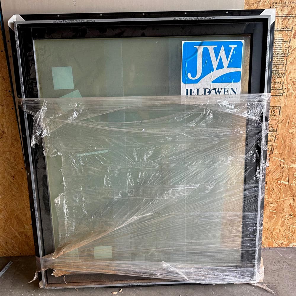 Jeld-Wen Casement Window 48" x 56" with primed interior, black exterior and sash