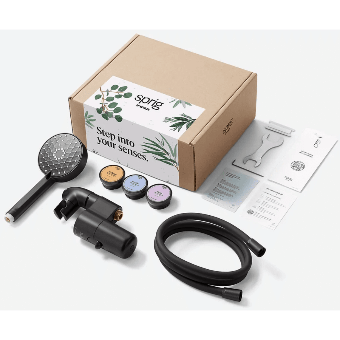 Kohler Sprig Infusion Device Kit in matte black metal with handshower and accessories