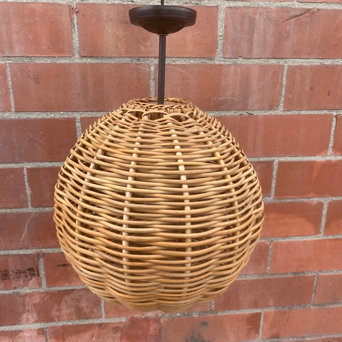 Pair of 17" vintage wicker pendant lights with 18" height and 5" rod