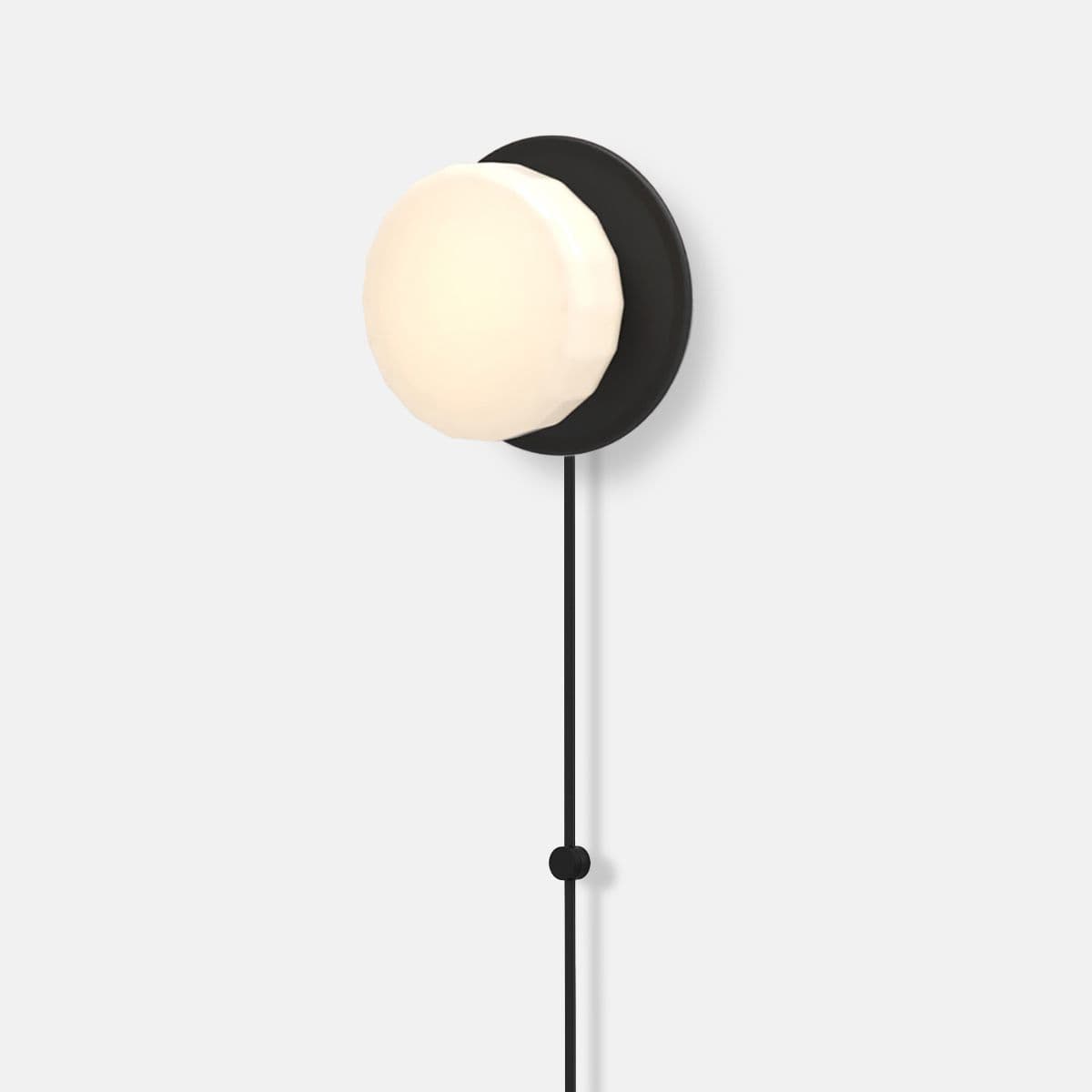 RBW | Pastille Disc Corded LED Wall Sconce — Matte Black, Faceted, Plug-in Bottom