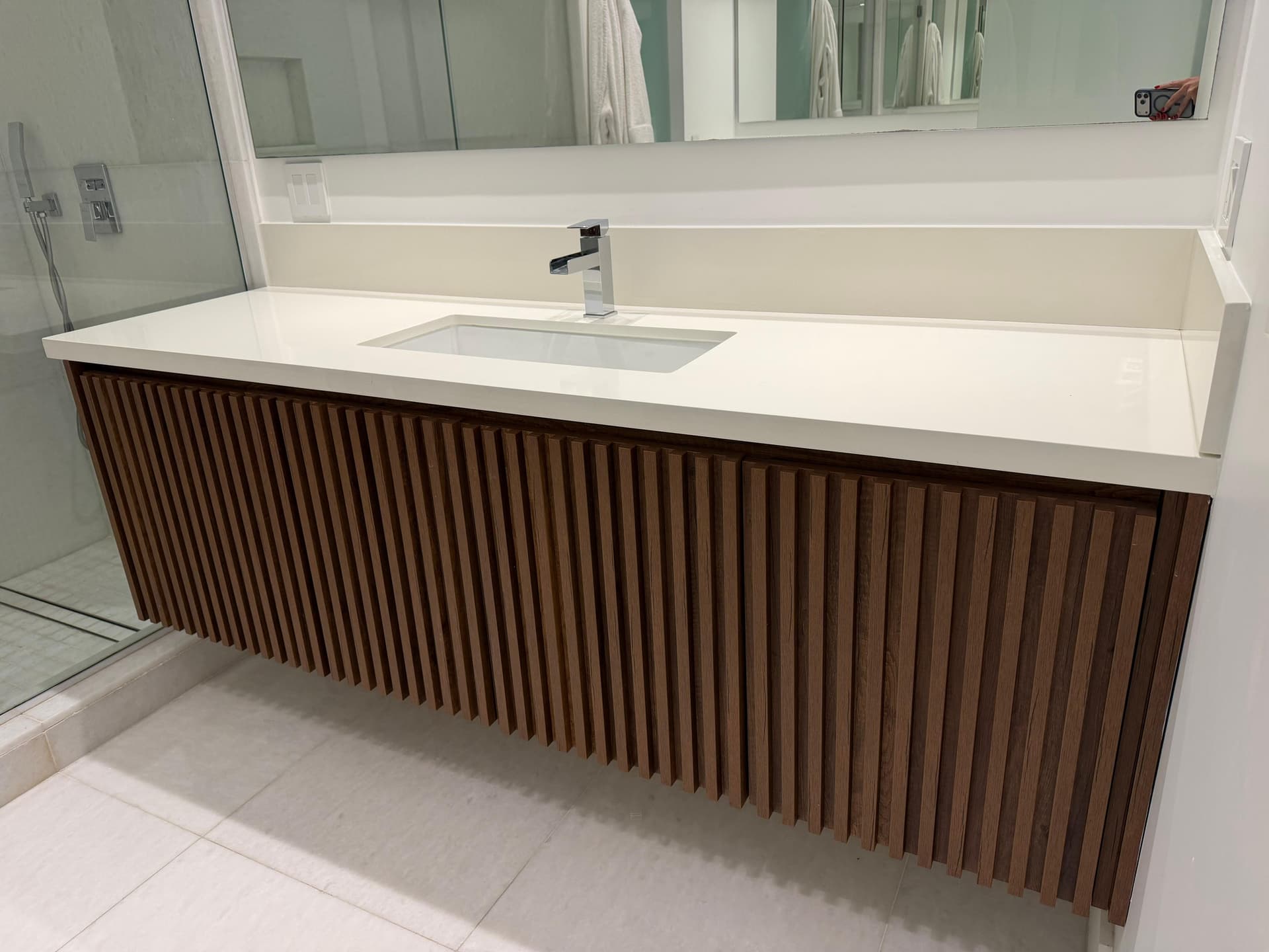 Armadi bathroom vanity with sink and countertop, brown melamine with comb design, beige linen interior, touch latch system