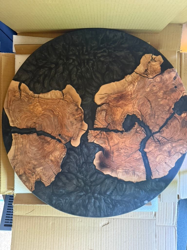 Live edge walnut and black resin tray, 24" diameter, with riser feet
