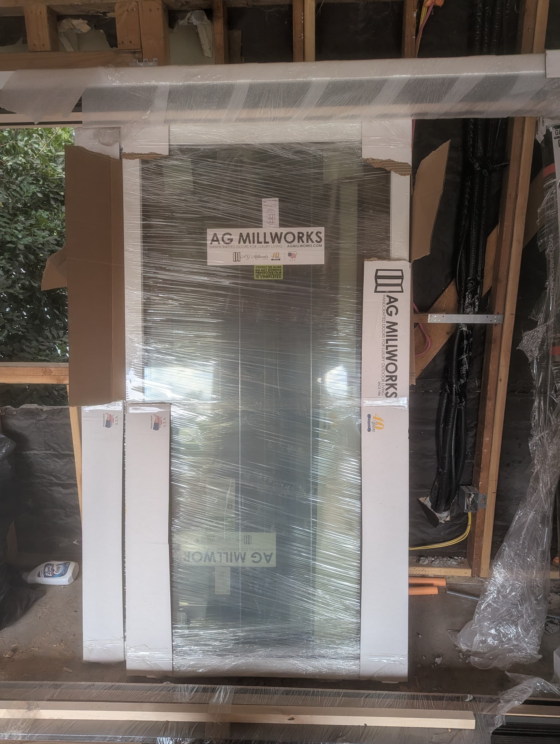Ag Millworks Bi-Fold Patio Door with embedded screen